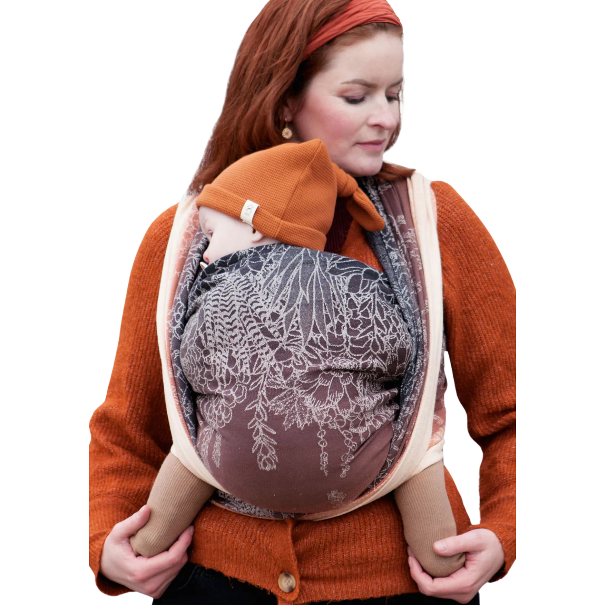 Oscha woven wrap baby carrier, made in the UK, with a parent wearing their baby in a stylish and comfortable wrap.