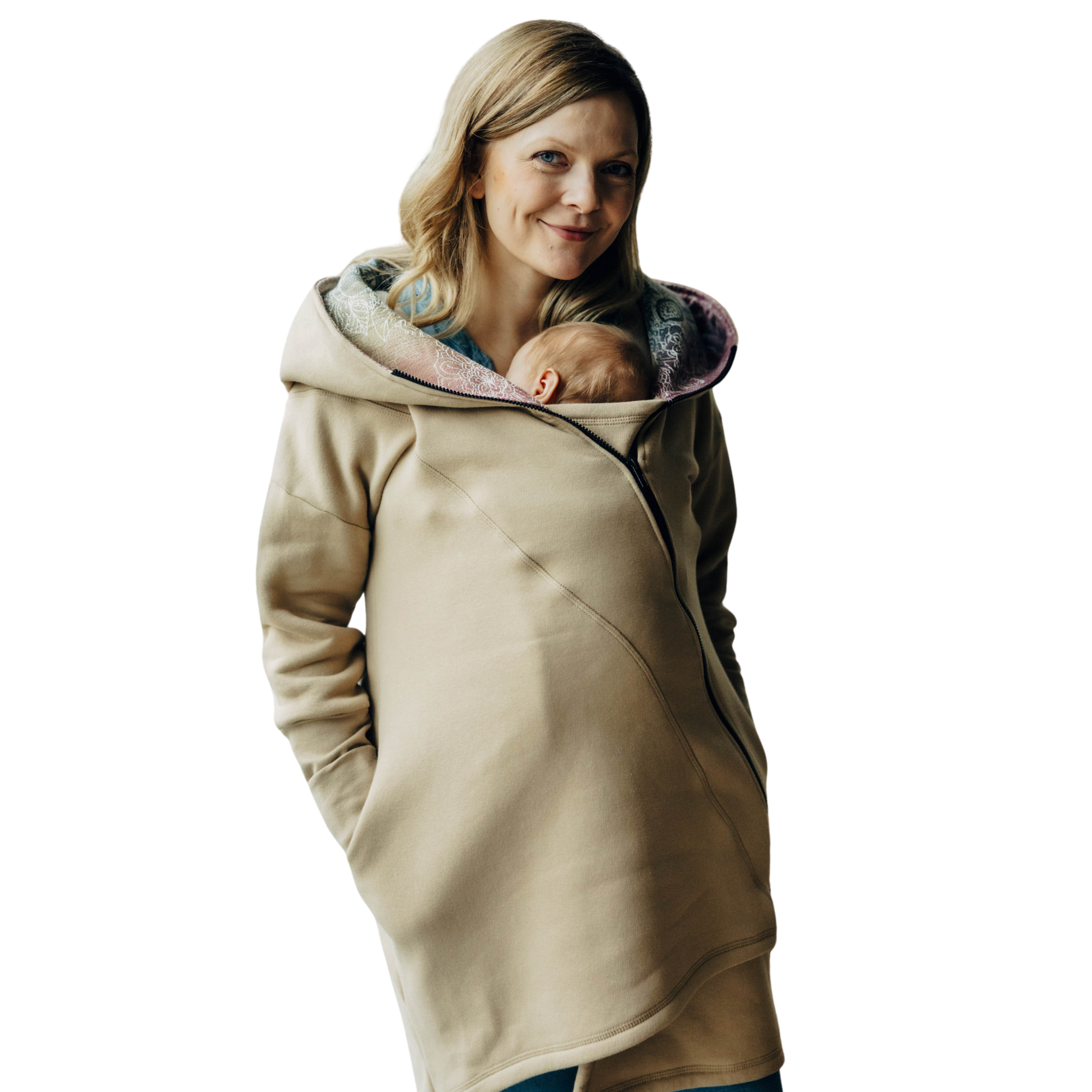 Parent wearing a cozy asymmetrical hoodie while babywearing, showcasing a stylish design with ribbed sleeves. The hoodie comfortably fits over the baby carrier, providing warmth and ease for both parent and baby