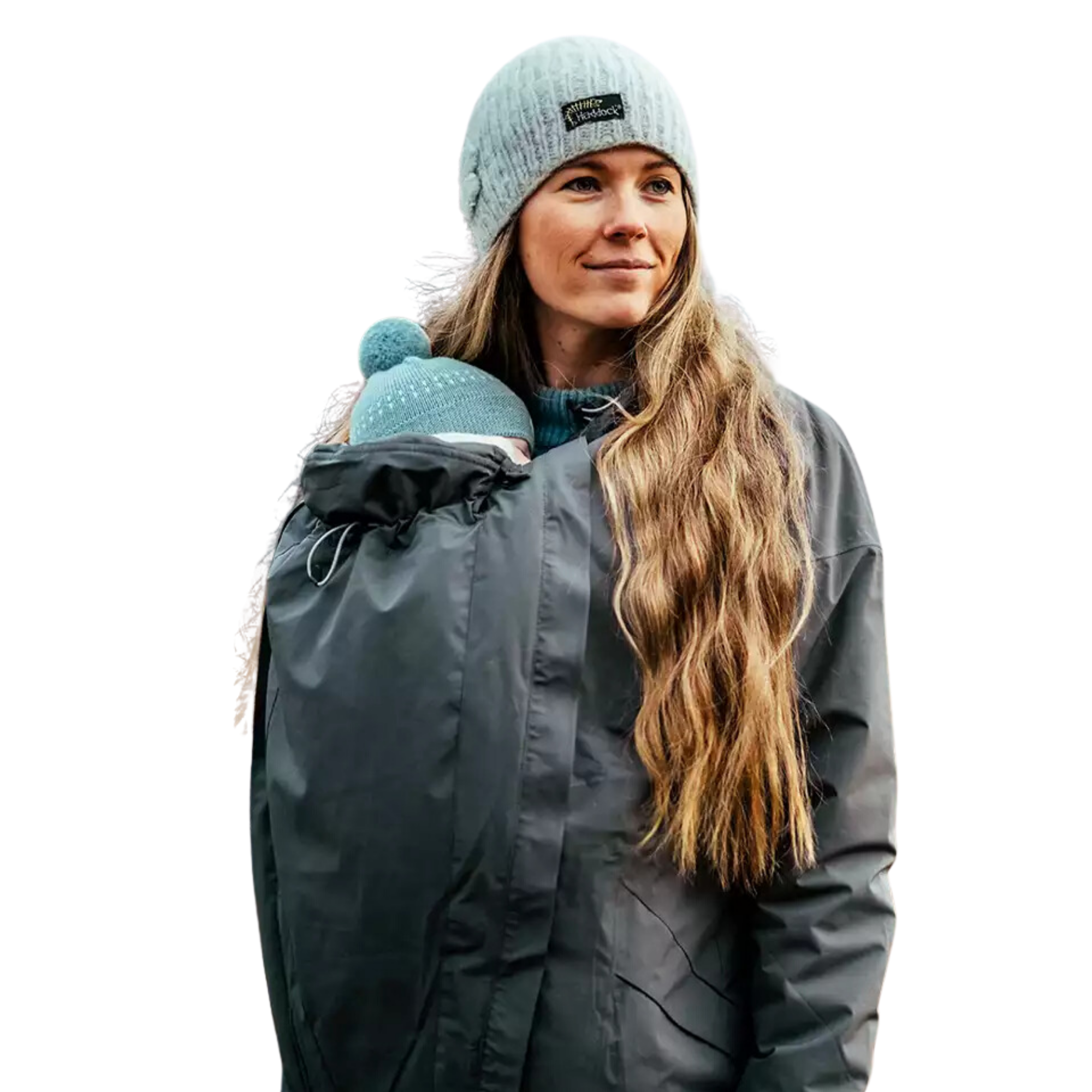 Parent wearing ethically made babywearing outerwear from top brands like Mamalila, Angel Wings, and LennyLamb, keeping both parent and baby warm and cozy