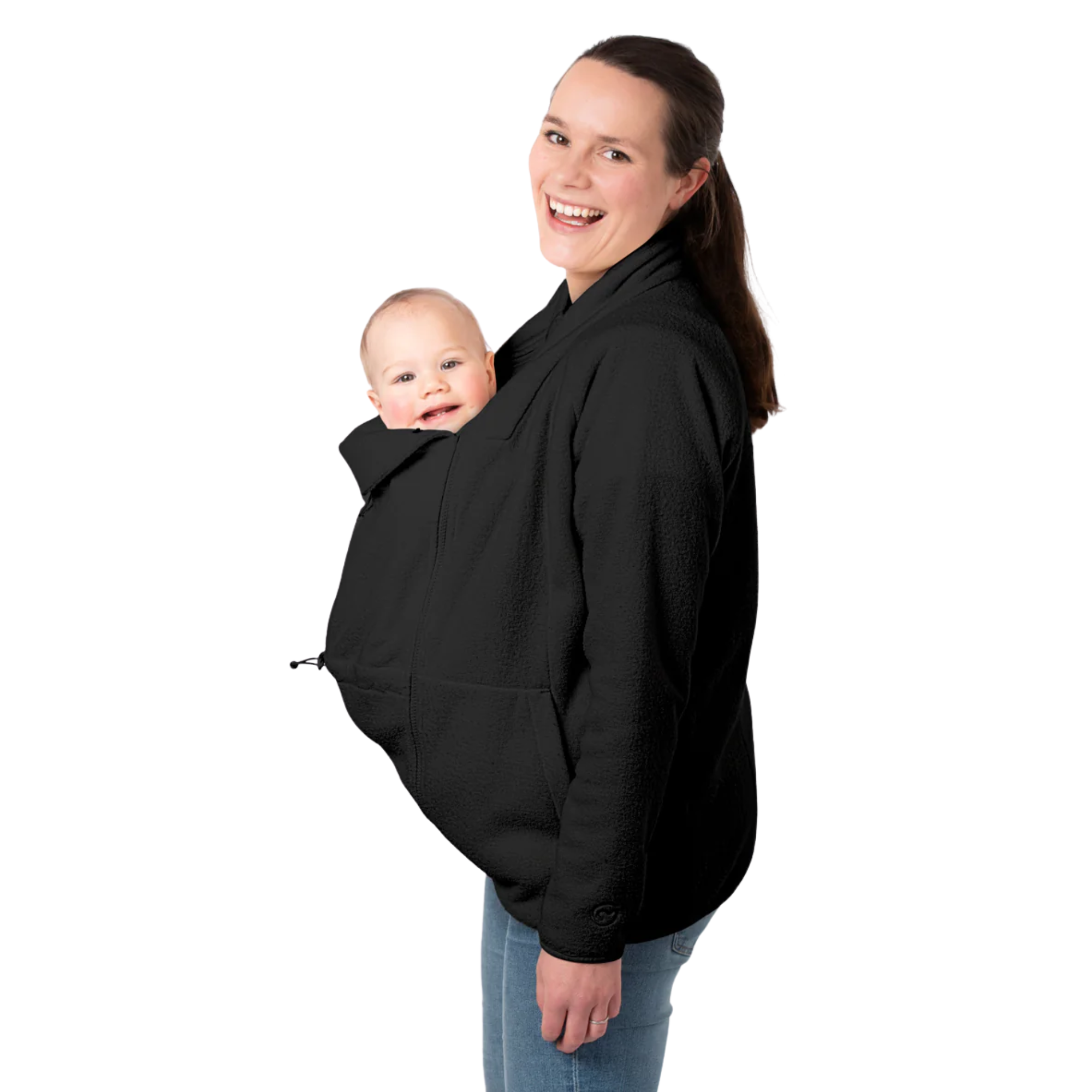 a babywearing fleece in black, layered over baby, for keeping both parent and baby cozy