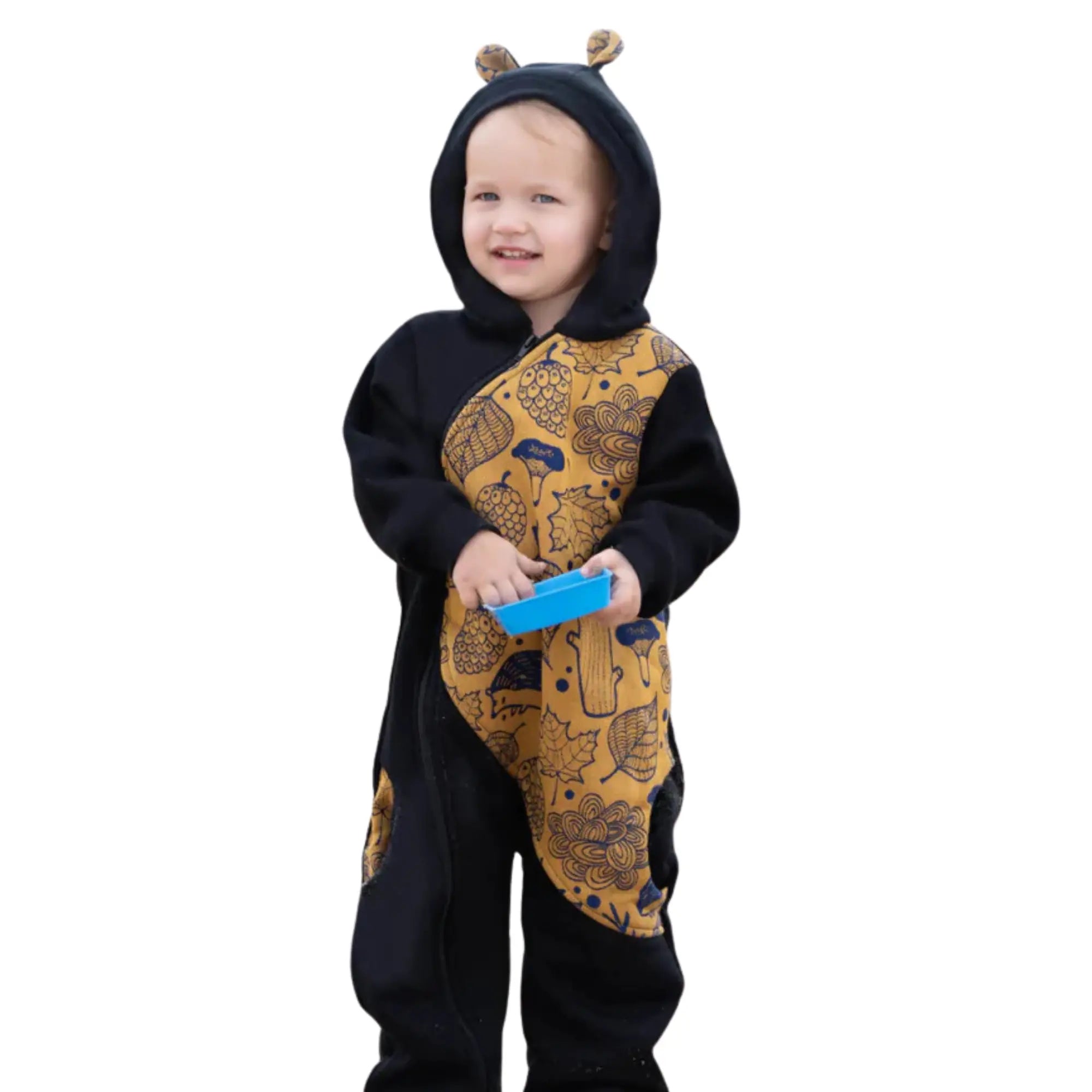 Child wearing a cozy LennyLamb Bear Romper made from soft, fleecy material, perfect for warmth and babywearing