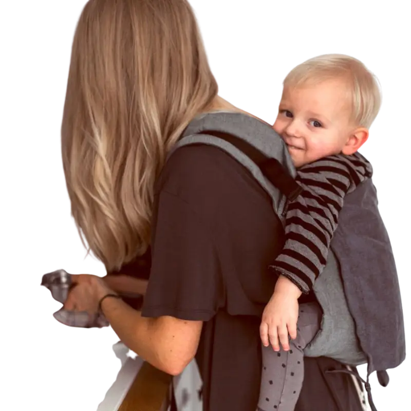 Copy of image of a woman wearing her baby in an onbuhimo a waistless back carrier