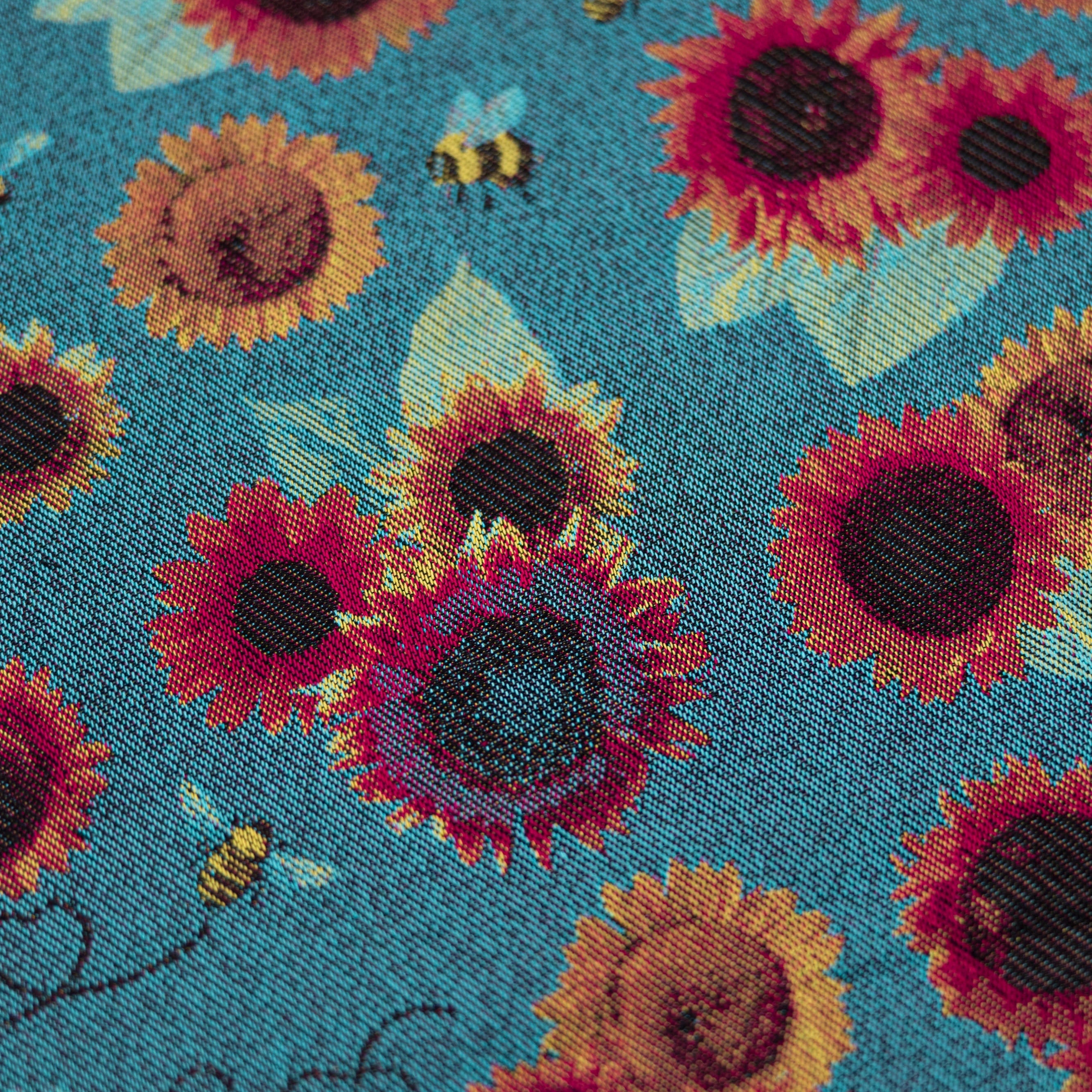 Decorative pattern with stylized figures and foliage and skulls on a orange background