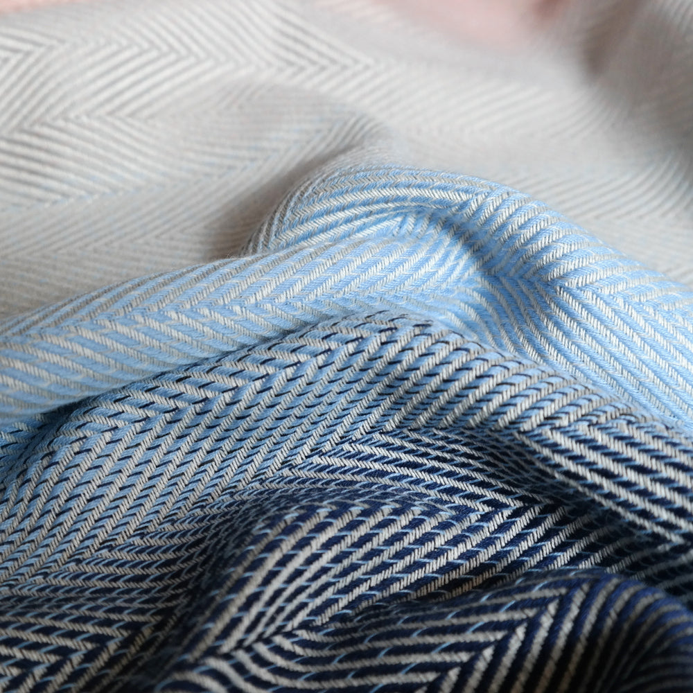 Lisca Opal Woven Wrap by Didymos, herringbone weave detail in blue and navy