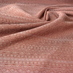 Prima Rosewood by Didymos, draped fabric showing the prima pattern